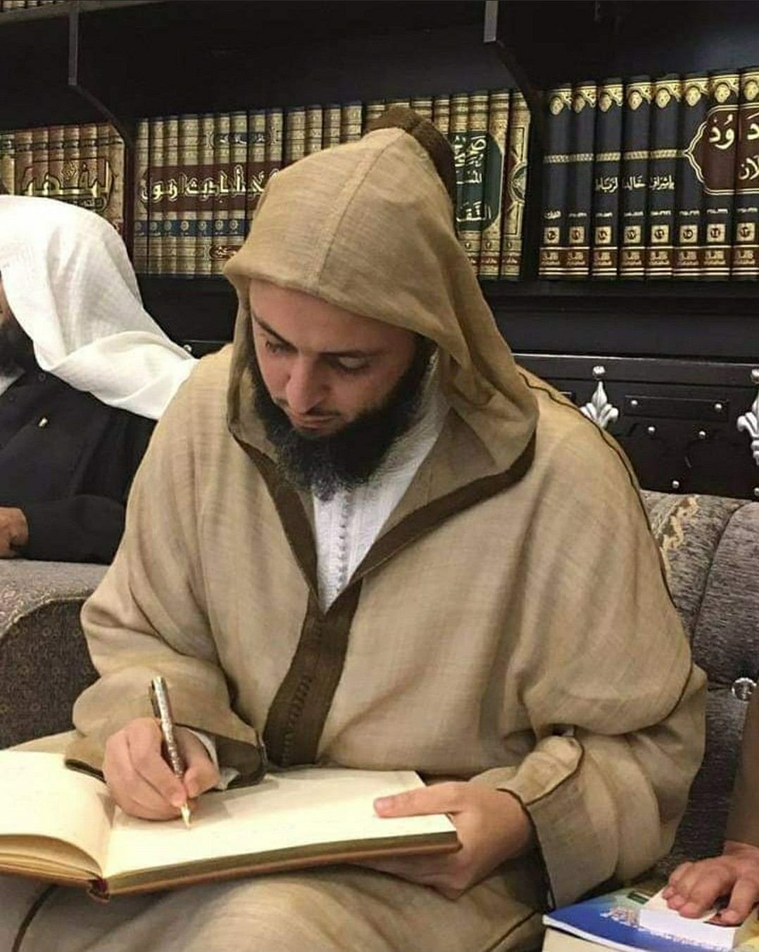 Traditional scholar wearing authentic garments